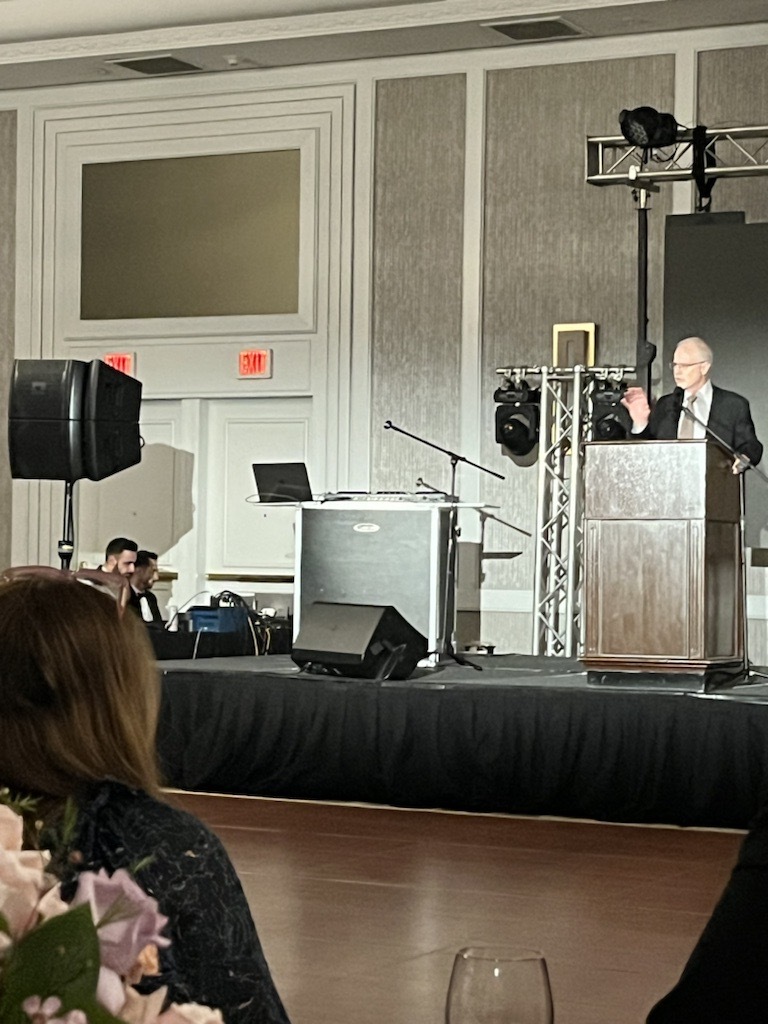 Grant Oliphant speaking at the Iranian American Bar Association Nowruz celebration